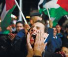 Palestinians celebrating in Ramallah after the PA was given status as a UN non-member state.