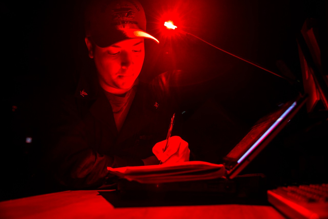 <p>PACIFIC OCEAN (Jan. 1, 2020) Quartermaster 3rd Class Ryan Gouger, from Newberg, Ore., writes the first deck log of the year while standing Quartermaster of the Watch on the bridge of the aircraft carrier USS Abraham Lincoln (CVN 72). The Abrah...
