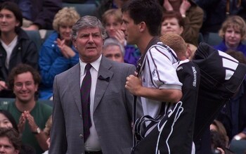 Alan Mills (left) and Tim Henman - Alan Mills, the referee who was the face of Wimbledon, dies aged 88